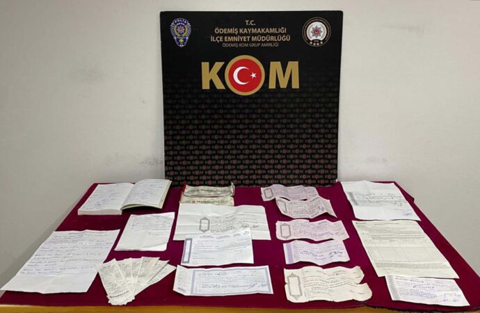 Ödemiş ilçesinde gerçekleştirilen operasyonda, tefecilik suçlamasıyla 6 kişi gözaltına alındı.