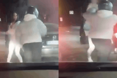 Kadın sürücü kendisini uyaran motorcuyu tekme tokat dövdü